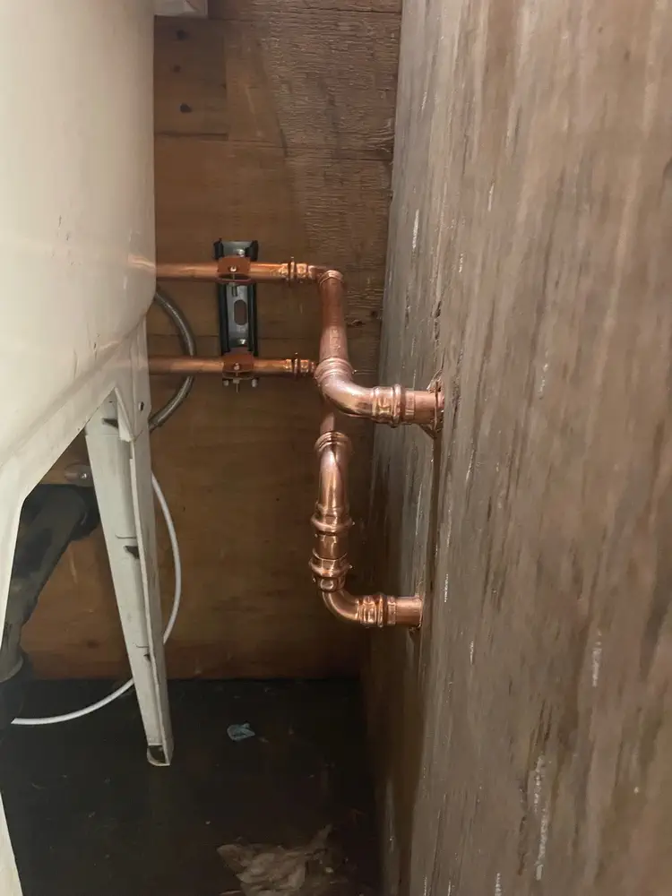 Exposed copper plumbing pipes